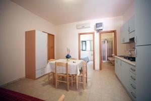 Kuchyň nebo kuchyňský kout v ubytování Villaggio San Pablo