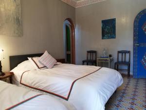 Postel nebo postele na pokoji v ubytování Villa du Souss