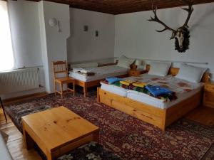 A bed or beds in a room at Borimechkova Kashta