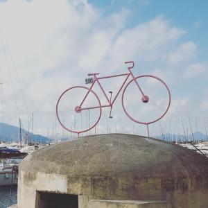 a bike statue on top of a building at Antonhouse Alghero in Alghero