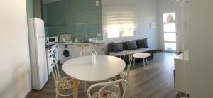 A kitchen or kitchenette at AT SAN MIGUEL o