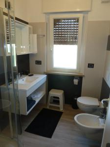 Koupelna v ubytování Albergo Casa Este