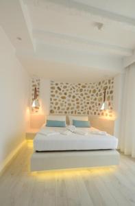 Кровать или кровати в номере La Pierre