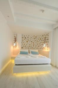 Ένα ή περισσότερα κρεβάτια σε δωμάτιο στο La Pierre