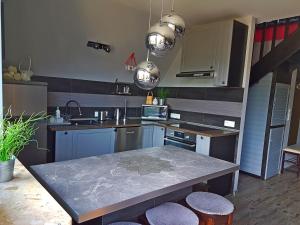 Kuchyňa alebo kuchynka v ubytovaní Apartament Podkowa z widokiem na Giewont