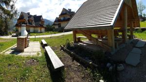 Vonkajšia záhrada v ubytovaní Apartament Podkowa z widokiem na Giewont