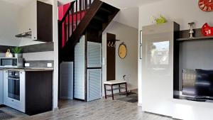 Kuchyňa alebo kuchynka v ubytovaní Apartament Podkowa z widokiem na Giewont