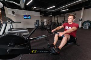 a man sitting on a treadmill in a gym at Plaza Hotel & Casino in Las Vegas