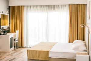 Postel nebo postele na pokoji v ubytování Villa Delux