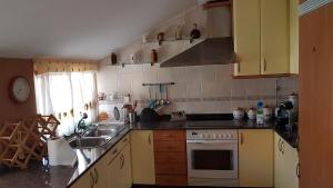 Kuchyňa alebo kuchynka v ubytovaní Apartamento con estupendas vistas