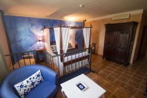 A bed or beds in a room at Hotel Sierra Quilama
