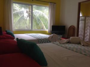 A bed or beds in a room at Casa Pili