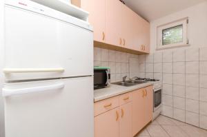 Kuchyňa alebo kuchynka v ubytovaní Apartments Vincic