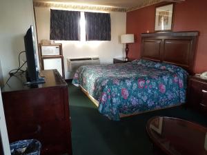 Postel nebo postele na pokoji v ubytování Townhouse Motel