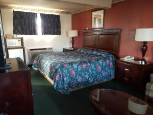 Postel nebo postele na pokoji v ubytování Townhouse Motel