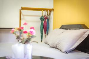 Postel nebo postele na pokoji v ubytování Tuk Tuk Guesthouse