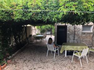 Vonkajšia záhrada v ubytovaní Villa Lorenta Apartments