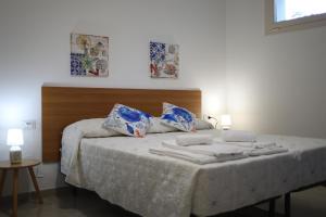 Posteľ alebo postele v izbe v ubytovaní Villa Le Mimose