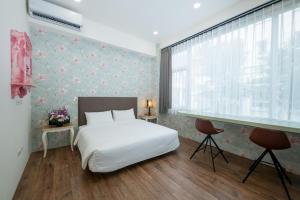 Imagen de la galería de R&J Guesthouse, en Yuanshan