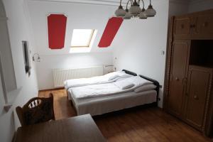 Postel nebo postele na pokoji v ubytování Eged Vendégház
