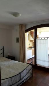 Voodi või voodid majutusasutuse B&B Castiglias toas