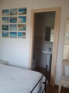 Voodi või voodid majutusasutuse B&B Castiglias toas