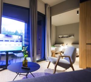 Posezení v ubytování One Suite Hotel