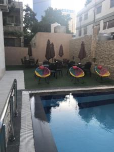 The swimming pool at or close to Almond Hotel Apartments