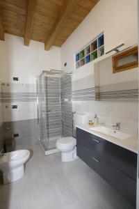 Koupelna v ubytování B&B L'Antico Portico + 14 fotografií