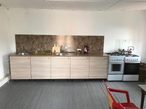 Kuchyň nebo kuchyňský kout v ubytování Comfort Guest House