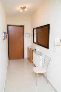 Televízia a/alebo spoločenská miestnosť v ubytovaní Sea Side Lux family appartment