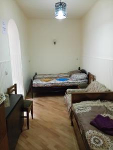 Cama ou camas em um quarto em Apartment on Sulkhan-Saba Roma