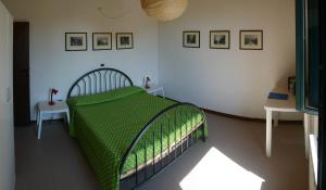 A bed or beds in a room at Casaleaurelia