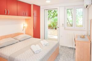 Apartments Majić客房内的一张或多张床位
