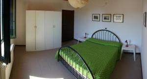 A bed or beds in a room at Casaleaurelia