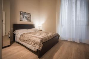 Postel nebo postele na pokoji v ubytování Hotel Torre Guelfa Palazzo Acciaiuoli