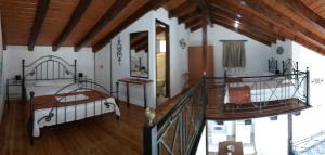 A bed or beds in a room at Iron House