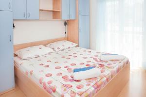 Apartments Majić客房内的一张或多张床位