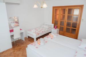 Apartments Majić客房内的一张或多张床位