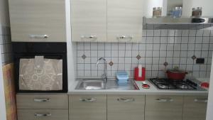 Kuchyň nebo kuchyňský kout v ubytování Casa Vacanze Leo