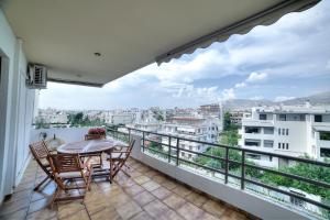 A balcony or terrace at Athens Glyfada Riviera Apartment
