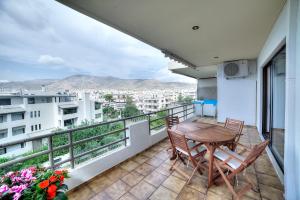 A balcony or terrace at Athens Glyfada Riviera Apartment