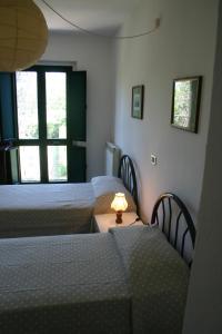 A bed or beds in a room at Casaleaurelia