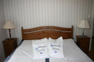 Säng eller sängar i ett rum på Borggården Apartment