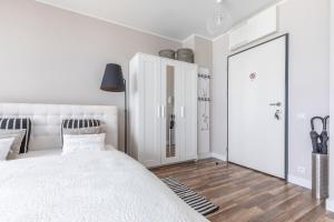 Posteľ alebo postele v izbe v ubytovaní Apartament Prestige & Sea Horyzont 613