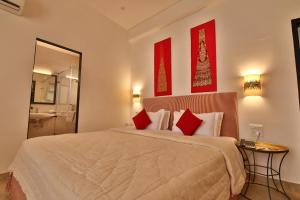 מיטה או מיטות בחדר ב-Villa 243
