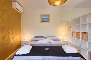 Postel nebo postele na pokoji v ubytování Luxury Apartment Fabris