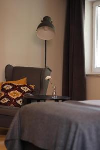 Łóżko lub łóżka w pokoju w obiekcie Apartamenty Centrum Park Sowińskiego 19