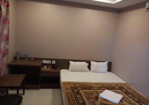 Hotel Raj Palace客房内的一张或多张床位