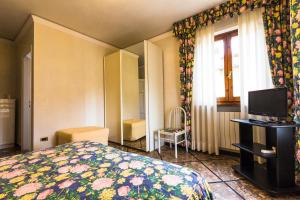 TV a/nebo společenská místnost v ubytování Hotel Sonia